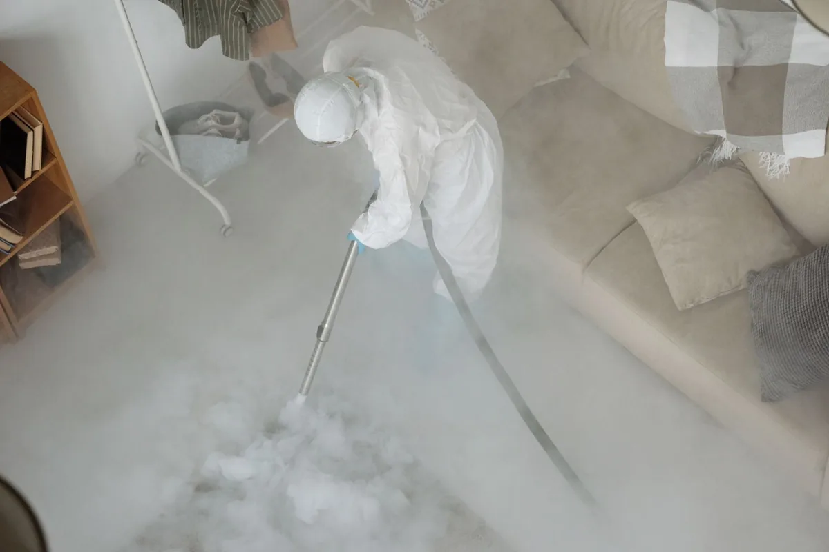 Biohazard cleanup technician in protective equipment, South Shore, KY